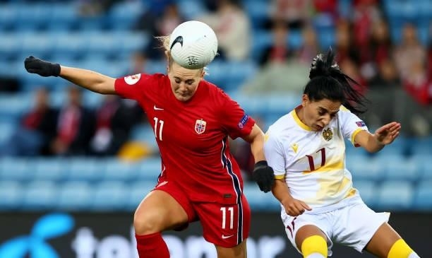 Lisa Marie Utland of Norway challenges Nora Yeghyan of Armenia during the FIFA Women's World Cup 2023 Qualifier group F match between Norway and...