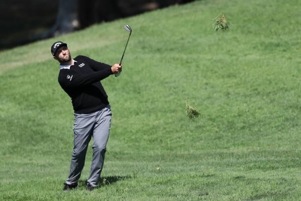 Jon Rahm hits from the rough on the eighth hole during round one of the Fortinet Championship at Silverado Resort and Spa on September 16, 2021 in...