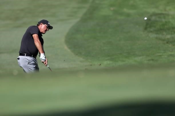 Phil Mickelson hits an approach shot on the eighth hole during round one of the Fortinet Championship at Silverado Resort and Spa on September 16,...