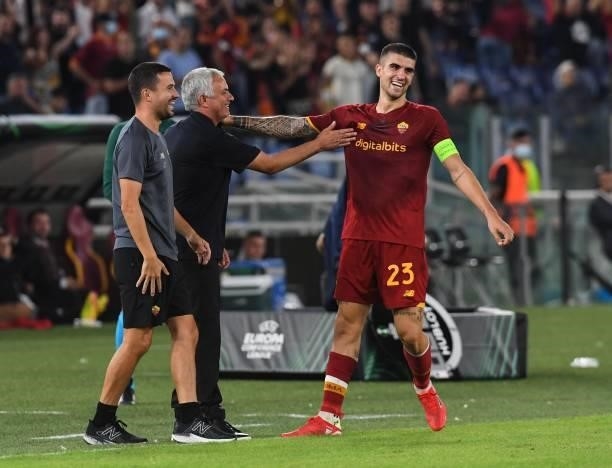 Gianluca Mancini of AS Roma celebrates with Jose Mourinho after scoring goal to bring the score to 4-1 during the UEFA Europa Conference League group...