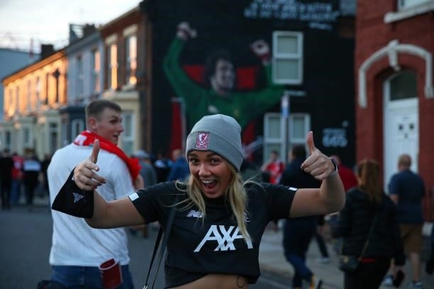 Supporters of Liverpool arrive at Anfield for the UEFA Champions League group B match between Liverpool FC and AC Milan at Anfield on September 15,...