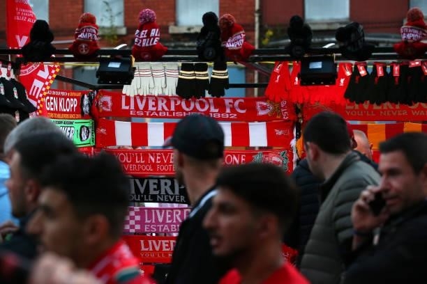 Scarves are seen on sale outside Anfield prior to the UEFA Champions League group B match between Liverpool FC and AC Milan at Anfield on September...