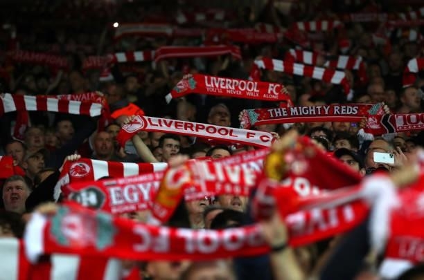 Liverpool fans in The Kop show their support during the UEFA Champions League group B match between Liverpool FC and AC Milan at Anfield on September...