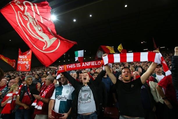 Liverpool fans in The Kop show their support during the UEFA Champions League group B match between Liverpool FC and AC Milan at Anfield on September...