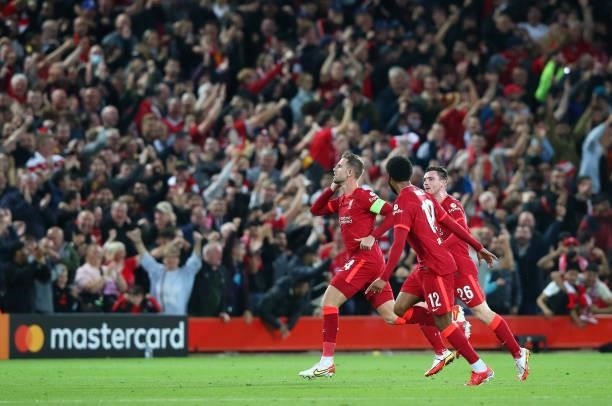 Jordan Henderson of Liverpool FC celebrates after scoring their third goal during the UEFA Champions League group B match between Liverpool FC and AC...