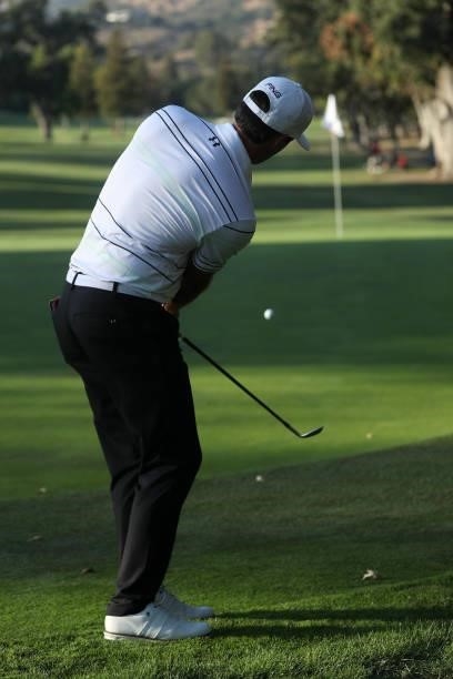 Mito Pereira of Chile chips on the 16th hole during round one of the Fortinet Championship at Silverado Resort and Spa on September 16, 2021 in Napa,...