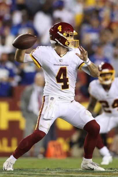 Taylor Heinicke of the Washington Football Team looks to pass during the second quarter against the New York Giants at FedExField on September 16,...