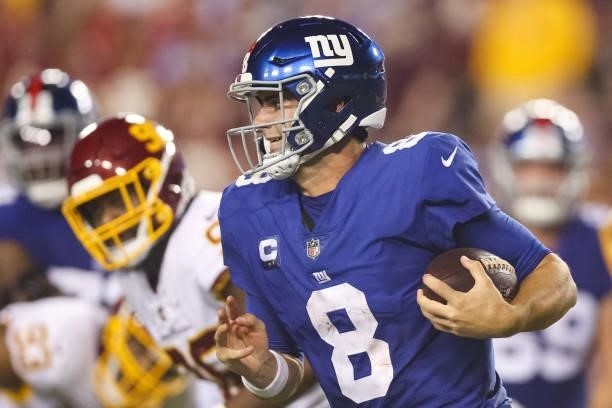 Daniel Jones of the New York Giants rushes during the second quarter against the Washington Football Team at FedExField on September 16, 2021 in...