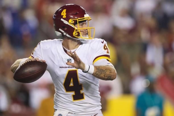 Taylor Heinicke of the Washington Football Team looks to pass during the second quarter against the New York Giants at FedExField on September 16,...