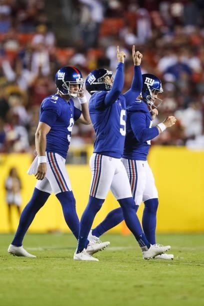 Graham Gano of the New York Giants celebrates a field goal during the third quarter against the Washington Football Team at FedExField on September...