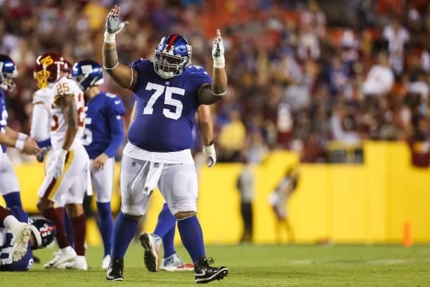 Danny Shelton of the New York Giants celebrates a field goal during the third quarter against the Washington Football Team at FedExField on September...