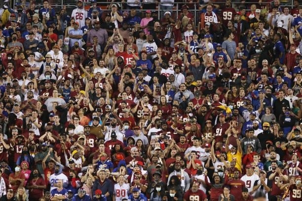 Fans look on during a game between the Washington Football Team and the New York Giants at FedExField on September 16, 2021 in Landover, Maryland.