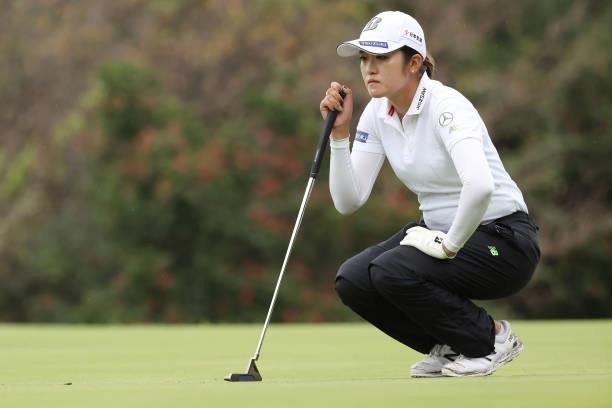 Mone Inami of Japan lines up her putt on the 17th hole during the first round of the Sumitomo Life Vitality Ladies Tokai Classic at Shin Minami Aichi...