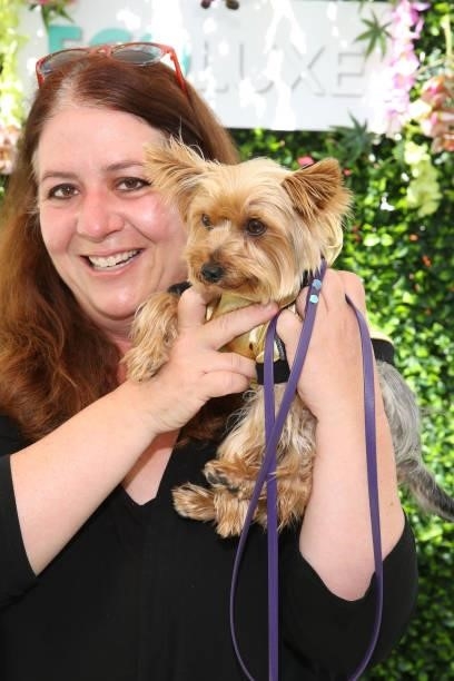 Bode the Yorkie and Debbie Perry attend the 15th Annual ECOLUXE "Endless Summer