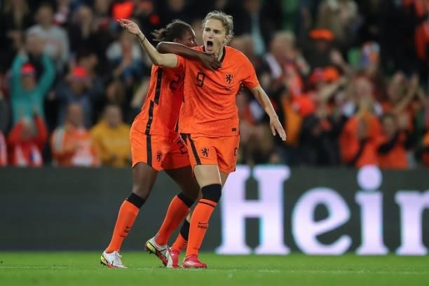 Vivianne Miedema of Netherlands celebrates after scoring their side`s first goal with teammate Lineth Beerensteyn of Netherlands during the FIFA...