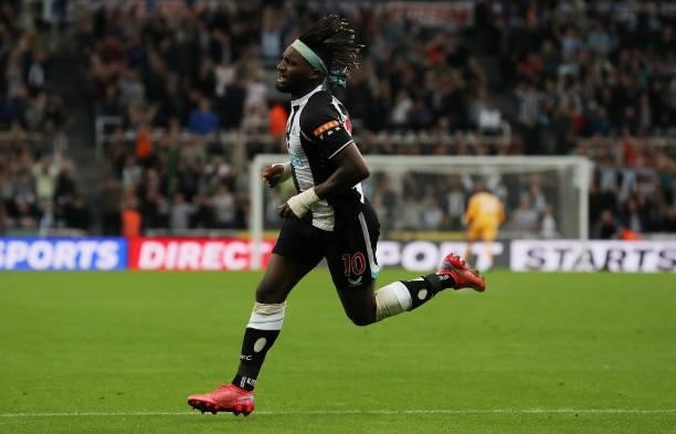 Allan Saint-Maximin of Newcastle United celebrates after scoring their team's first goal during the Premier League match between Newcastle United and...