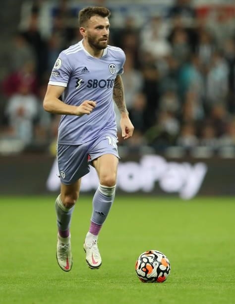 Stuart Dallas of Leeds United controls the ball during the Premier League match between Newcastle United and Leeds United at St. James Park on...