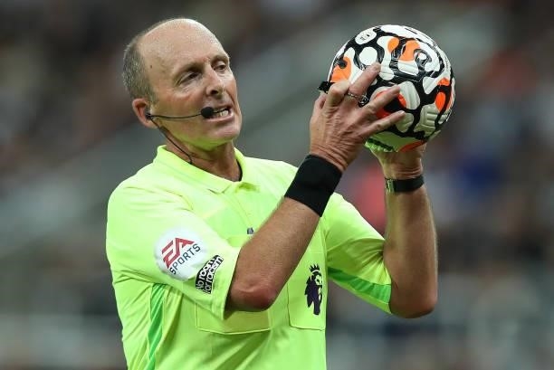Mike Dean is seen during the Premier League match between Newcastle United and Leeds United at St. James Park on September 17, 2021 in Newcastle upon...