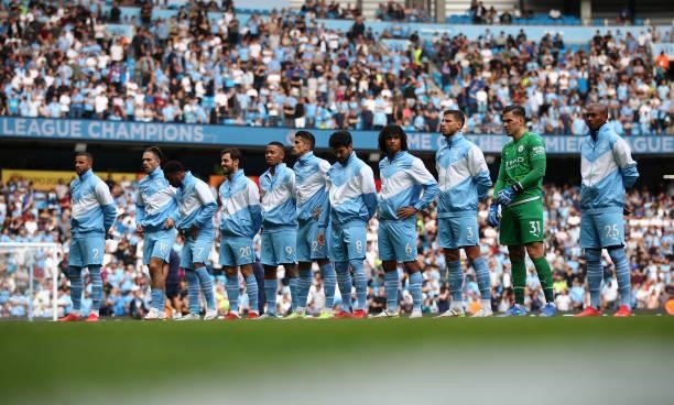 Players of Manchester City line up prior to the Premier League match between Manchester City and Southampton at Etihad Stadium on September 18, 2021...