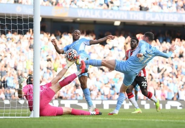 Raheem Sterling of Manchester City scores a goal which is later disallowed due to offside during the Premier League match between Manchester City and...