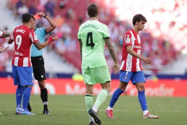 Referre Gil Manmzano shows the red card to Joao Felix of Atletico de Madrid during the La Liga Santander match between Club Atletico de Madrid and...