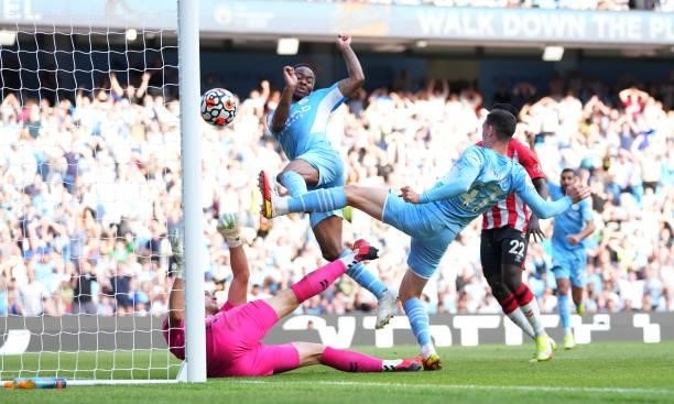 Raheem Sterling of Manchester City scores a goal which is later disallowed due to offside during the Premier League match between Manchester City and...