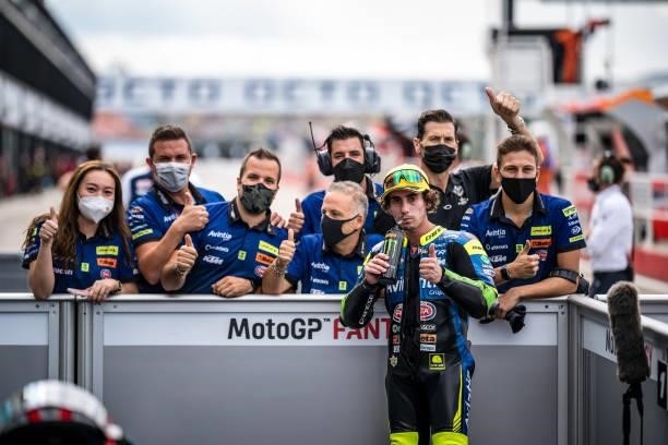 Moto3 rider Niccolò Antonelli of Italy and Avintia VR46 with his team at parc ferme during the qualifying session of the MotoGP Gran Premio Octo di...
