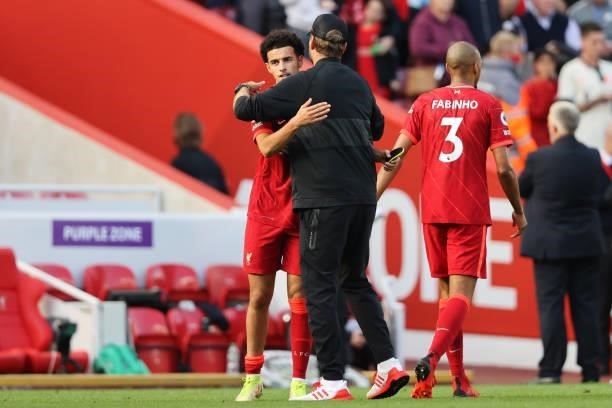Jurgen Klopp, Manager of Liverpool interacts with Curtis Jones of Liverpool following the Premier League match between Liverpool and Crystal Palace...