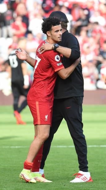 Jurgen Klopp manager of Liverpool with Curtis Jones of Liverpool at the end of thePremier League match between Liverpool and Crystal Palace at...