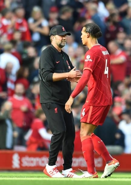 Virgil van Dijk of Liverpool with Jurgen Klopp manager of Liverpool at the end of the Premier League match between Liverpool and Crystal Palace at...