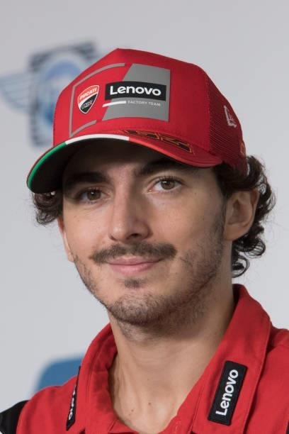 Francesco Bagnaia of Italy and Ducati Lenovo Team smiles during the press conference at the end of the qualifying practice during the MotoGP Of San...