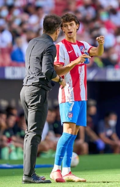 Diego Pablo Simeone head coach and Joao Felix of Atletico de Madrid speaking during the La Liga Santander match between Club Atletico de Madrid and...