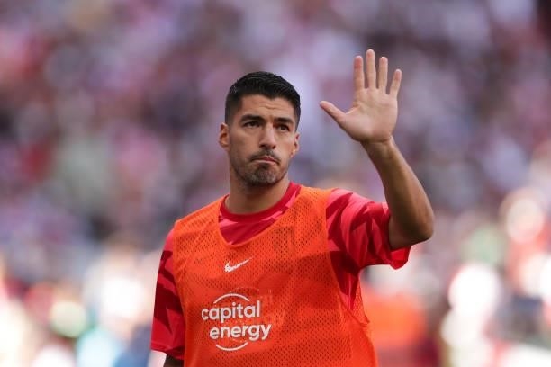 Luis Suarez of Atletico de Madrid acknowledges the audience as he warms up during the La Liga Santander match between Club Atletico de Madrid and...
