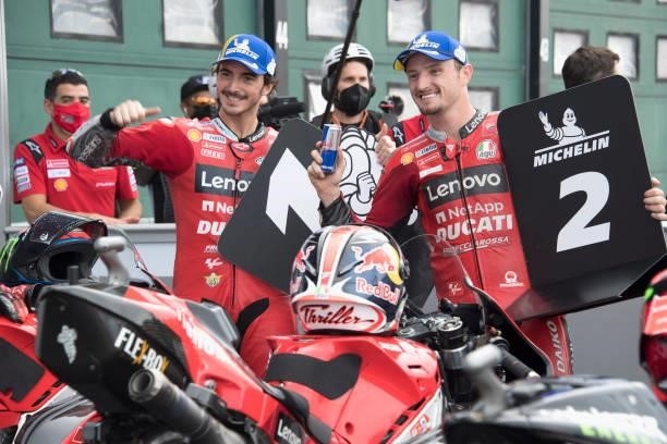 Jack Miller of Australia and Ducati Lenovo Team and Francesco Bagnaia of Italy and Ducati Lenovo Team celebrate at the end of the MotoGP qualifying...