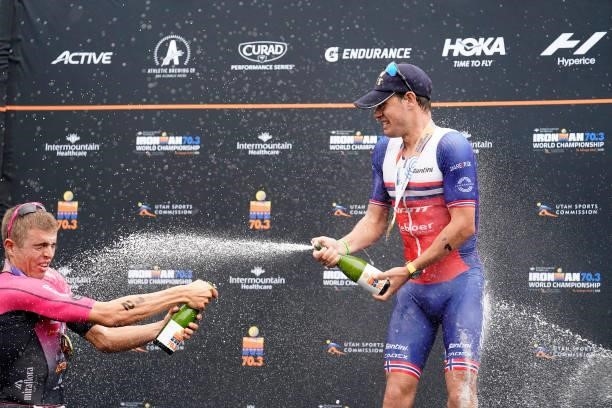 Sam Long of the United States celebrates with Gustav Iden of Norway after finishing first and second in the Men's Pro portion during the IRONMAN 70.3...