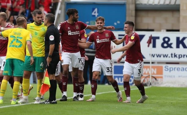 Kion Etete, Danny Rose and Aaron McGowan of Northampton Town celebrate a goal which was subequently disalowed during the Sky Bet League Two match...
