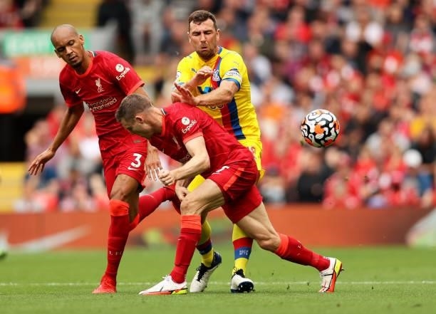 James McArthur of Crystal Palace and James Milner of Liverpool clash during the Premier League match between Liverpool and Crystal Palace at Anfield...