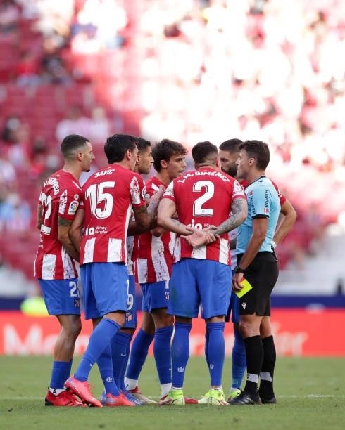 Joao Felix of Atletico de Madrid protests with his teammates Jose Maria Gimenez , Yannick Carrasco Luis Suarez , Stefan Savic and Mario Hermoso to...