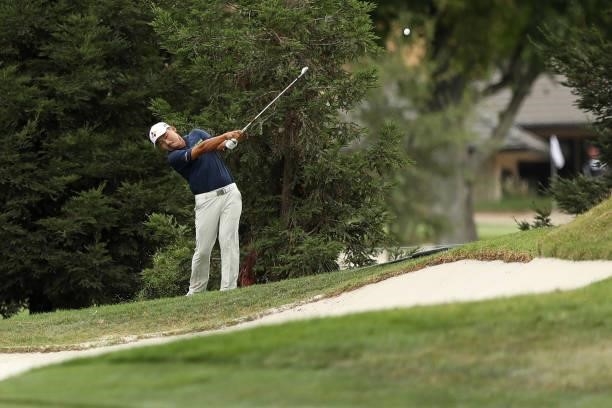 Sung Kang of South Korea hits an approach shot on the 13th hole during round three of the Fortinet Championship at Silverado Resort and Spa on...