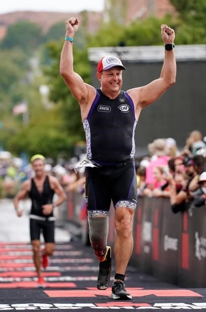 Earl Barnes of the United States reacts after finishing the running leg during the IRONMAN 70.3 World Championship on September 18, 2021 in St...