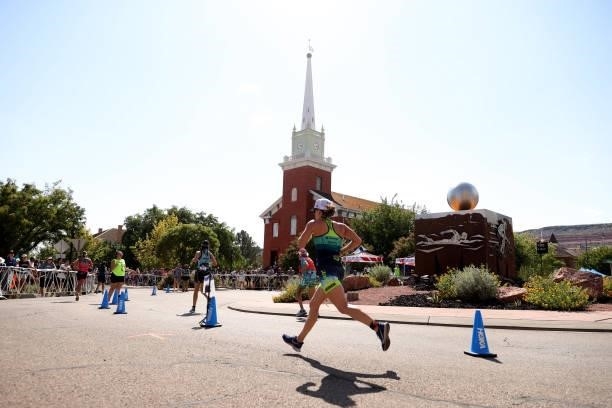 Athletes head toward the finish line during the running leg during the IRONMAN 70.3 World Championship on September 18, 2021 in St George, Utah.