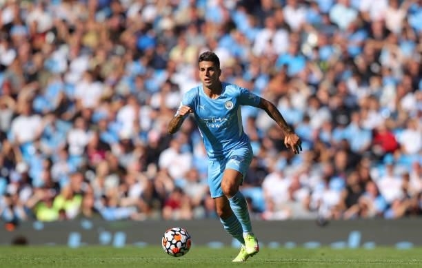 Joao Cancelo of Manchester City runs with the ball during the Premier League match between Manchester City and Southampton at Etihad Stadium on...