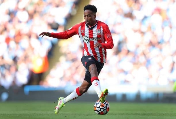 Kyle Walker-Peters of Southampton runs with the ball during the Premier League match between Manchester City and Southampton at Etihad Stadium on...