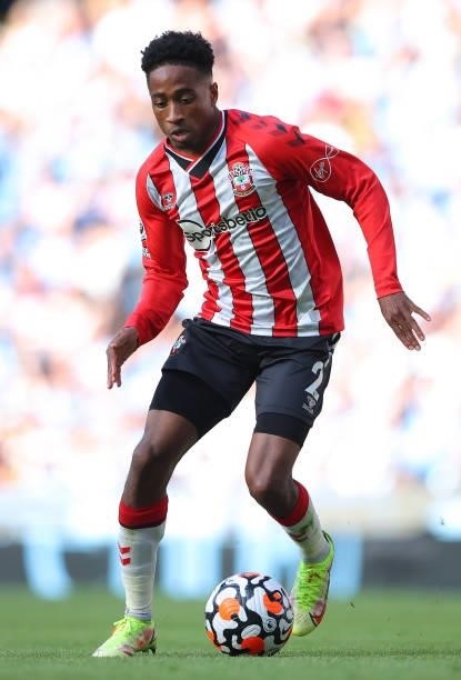 Kyle Walker-Peters of Southampton runs with the ball during the Premier League match between Manchester City and Southampton at Etihad Stadium on...