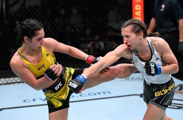 Ariane Lipski of Brazil kicks Mandy Bohm of Germany in a flyweight fight during the UFC Fight Night event at UFC APEX on September 18, 2021 in Las...