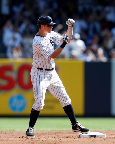LeMahieu of the New York Yankees reacts at second base after his double during the first inning against the Cleveland Indians at Yankee Stadium on...