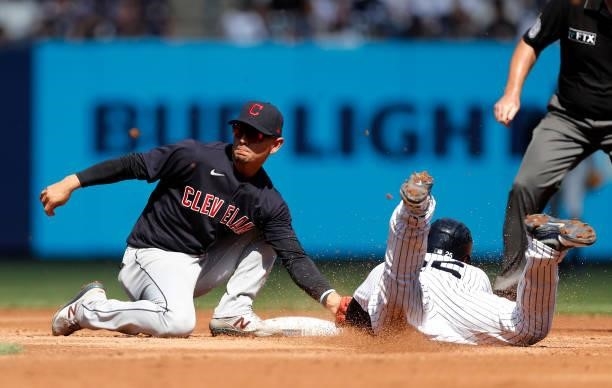 Gleyber Torres of the New York Yankees is caught stealing second base by Andres Gimenez of the Cleveland Indians during the second inning at Yankee...