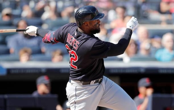 Franmil Reyes of the Cleveland Indians follows through on a fifth inning RBI double against the New York Yankees at Yankee Stadium on September 18,...