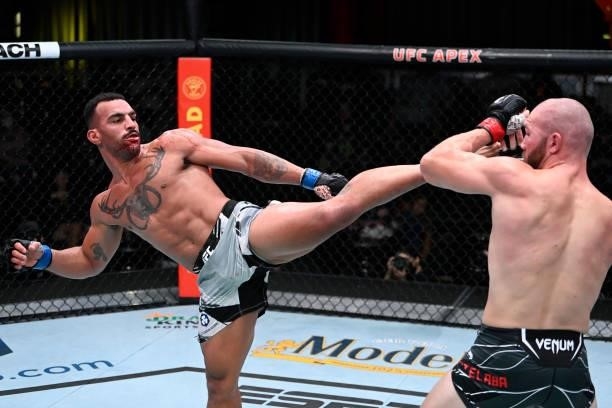 Devin Clark kicks Ion Cutelaba of Moldova in a light heavyweight fight during the UFC Fight Night event at UFC APEX on September 18, 2021 in Las...