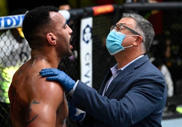 Devin Clark is examined by the doctor during his light heavyweight fight against Ion Cutelaba of Moldova during the UFC Fight Night event at UFC APEX...